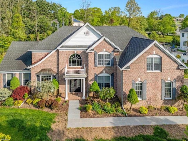 4 Greenbriar Ct, Mount Olive Twp, NJ 07836 - colonial inspired home with brick siding, a balcony, and roof with shingles