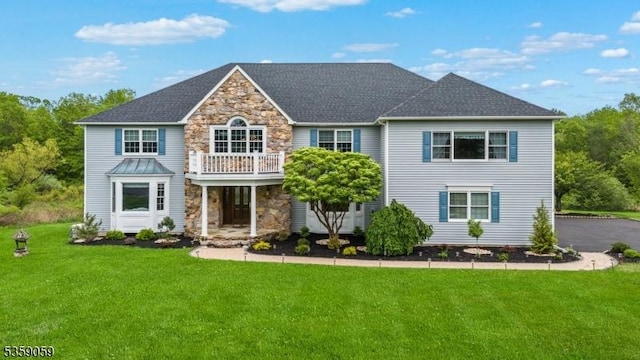 1 Fleming Rd, Tewksbury Twp, NJ 07830 - view of front of house with stone siding, a front yard, and a balcony