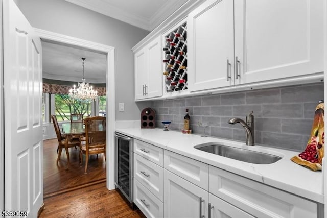 1 Fleming Rd, Tewksbury Twp, NJ 07830 - indoor bar with beverage cooler, crown molding, tasteful backsplash, wood finished floors, and a chandelier