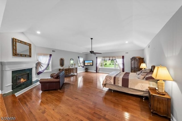 1 Fleming Rd, Tewksbury Twp, NJ 07830 - bedroom featuring a premium fireplace, wood finished floors, recessed lighting, lofted ceiling, and ceiling fan