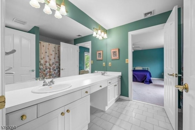 1 Fleming Rd, Tewksbury Twp, NJ 07830 - ensuite bathroom with a chandelier, double vanity, baseboards, and a ceiling fan