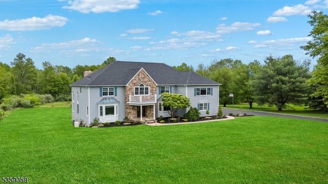 1 Fleming Rd, Tewksbury Twp, NJ 07830 - view of front facade featuring stone siding, a front yard, and a chimney
