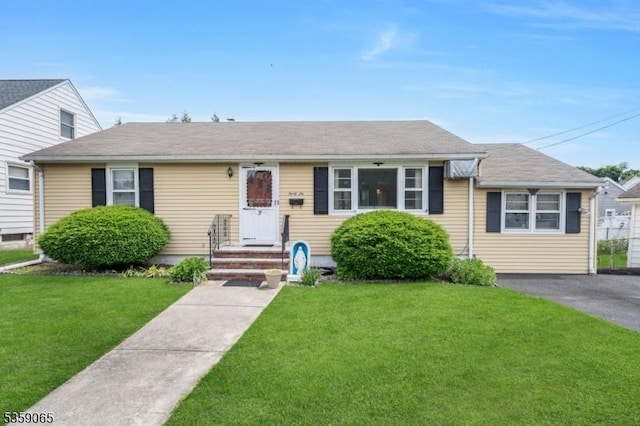 36 Bogert St, Totowa Boro, NJ 07512 - view of front of home with a front yard and roof with shingles