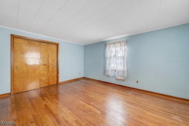 36 Bogert St, Totowa Boro, NJ 07512 - unfurnished bedroom with wood finished floors and baseboards