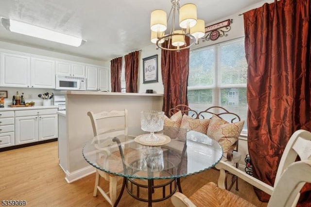 5 Prescott Ct, Condo, Bernards Twp, NJ 07920 - dining space with a chandelier and light wood finished floors