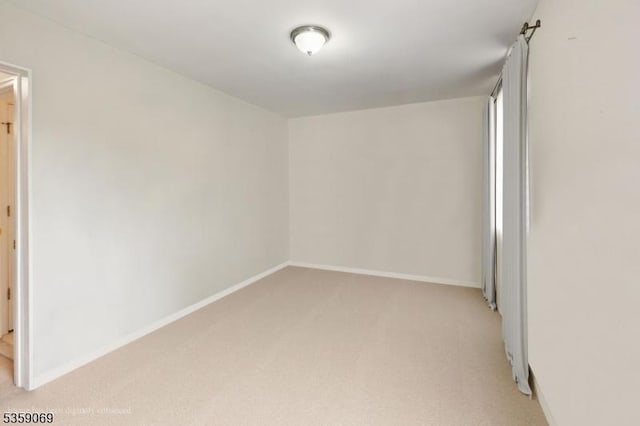 5 Prescott Ct, Condo, Bernards Twp, NJ 07920 - spare room featuring light carpet and baseboards