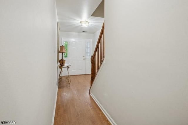 5 Prescott Ct, Condo, Bernards Twp, NJ 07920 - corridor with wood finished floors, stairs, and baseboards