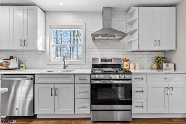 231 Sutphin Ln, Hillsborough Twp, NJ 08844 - kitchen featuring stainless steel appliances, wall chimney range hood, a sink, light countertops, and backsplash