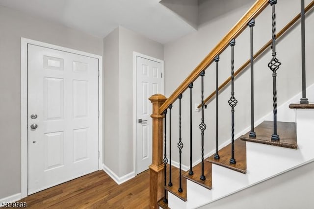 231 Sutphin Ln, Hillsborough Twp, NJ 08844 - entrance foyer featuring wood finished floors, baseboards, and stairway