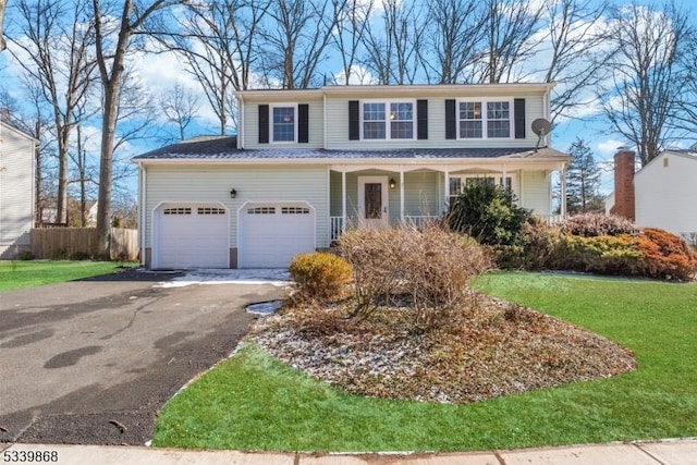 231 Sutphin Ln, Hillsborough Twp, NJ 08844 - traditional-style home featuring asphalt driveway and covered porch