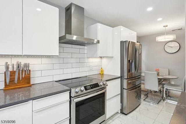 20 New Jersey Ave, Jefferson Twp, NJ 07849 - kitchen with stainless steel appliances, wall chimney range hood, light marble finish flooring, white cabinetry, and recessed lighting