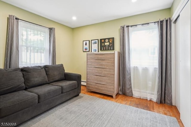 20 New Jersey Ave, Jefferson Twp, NJ 07849 - living room featuring wood finished floors, baseboard heating, and recessed lighting