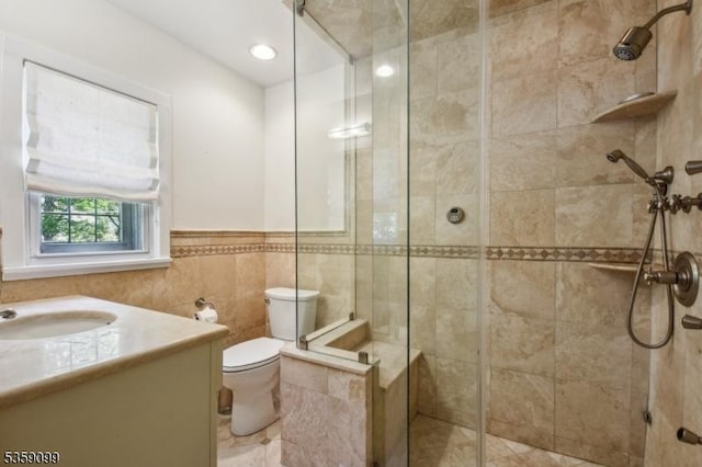 42 Haddonfield Rd, Millburn Twp, NJ 07078 - full bathroom with toilet, vanity, a shower stall, and a wainscoted wall