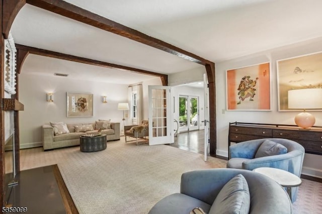 42 Haddonfield Rd, Millburn Twp, NJ 07078 - living area with beamed ceiling, carpet floors, baseboards, and french doors