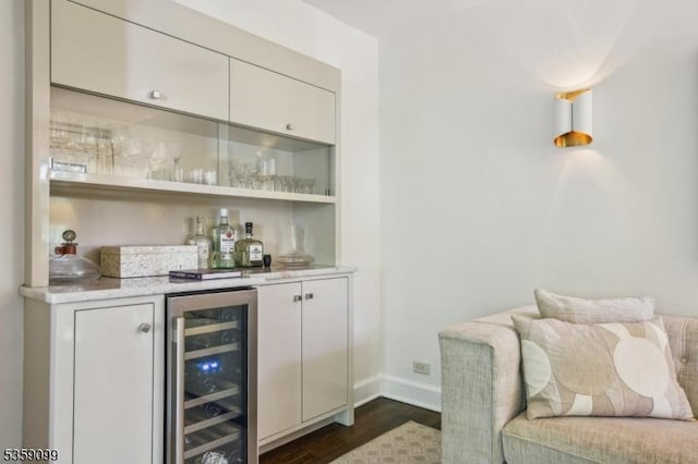 42 Haddonfield Rd, Millburn Twp, NJ 07078 - indoor dry bar featuring beverage cooler, dark wood finished floors, and baseboards