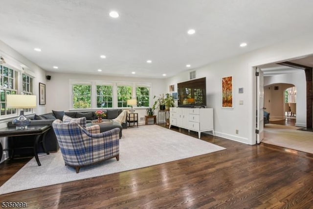 42 Haddonfield Rd, Millburn Twp, NJ 07078 - living area with arched walkways, wood finished floors, recessed lighting, and baseboards