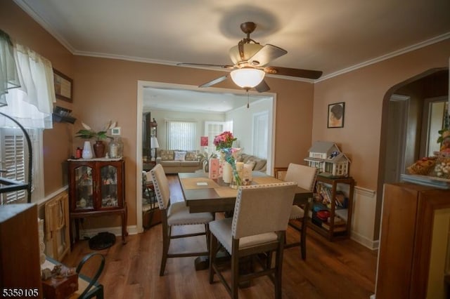 916 Sheridan Ave, Roselle Boro, NJ 07203 - dining space with ceiling fan, arched walkways, wood finished floors, and crown molding