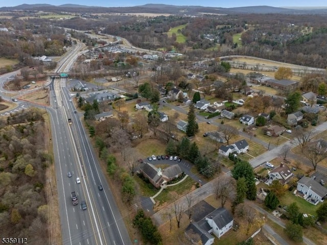16 Harrison St, Clinton Twp, NJ 08809 - aerial view of property and surrounding area featuring a main thoroughfare and mountains