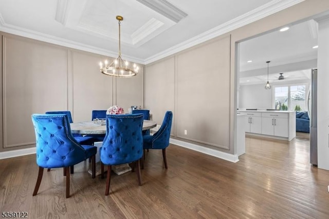 12-64 Orchard St, Fair Lawn Boro, NJ 07410 - dining space with a chandelier, wood finished floors, crown molding, and a decorative wall