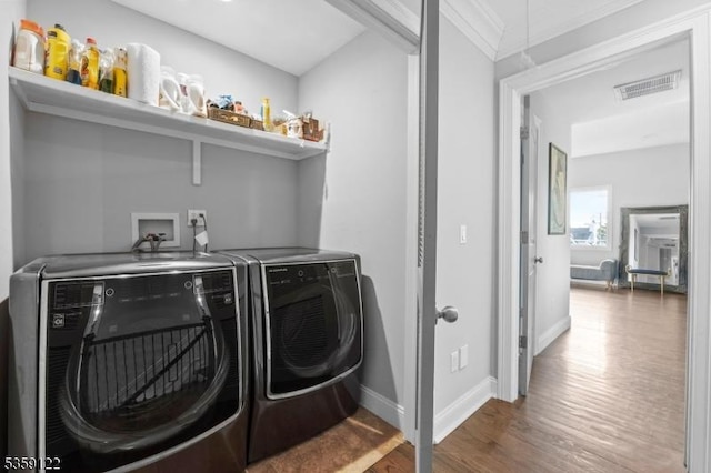 12-64 Orchard St, Fair Lawn Boro, NJ 07410 - washroom featuring independent washer and dryer, wood finished floors, ornamental molding, and baseboards