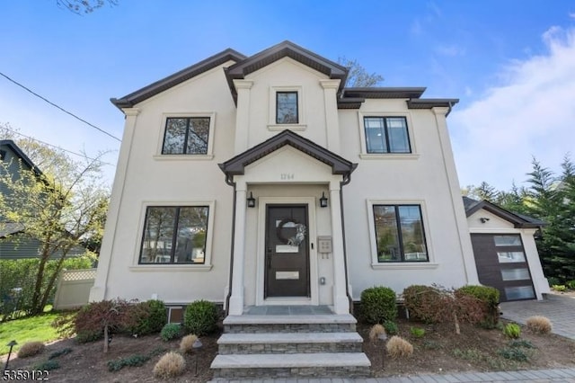 12-64 Orchard St, Fair Lawn Boro, NJ 07410 - view of front of property featuring stucco siding