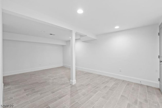 12-64 Orchard St, Fair Lawn Boro, NJ 07410 - finished basement featuring light wood-style floors, baseboards, and recessed lighting