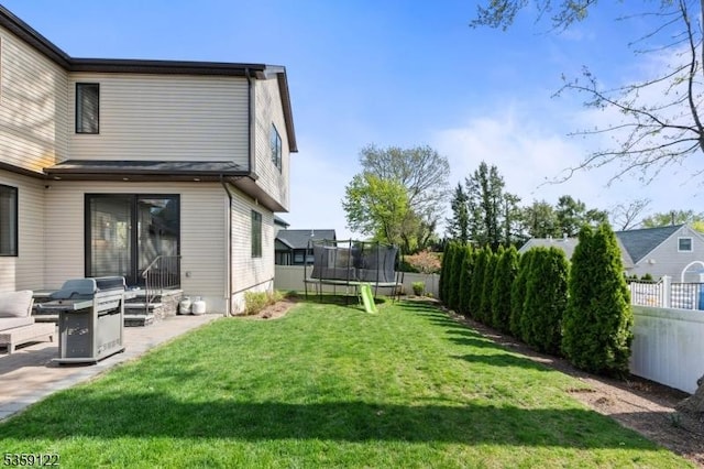 12-64 Orchard St, Fair Lawn Boro, NJ 07410 - view of yard with a trampoline and a patio area