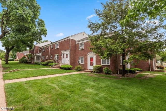 465 Maple Hill Dr Unit 51, Hackensack City, NJ 07601 - view of front of property featuring brick siding and a front lawn