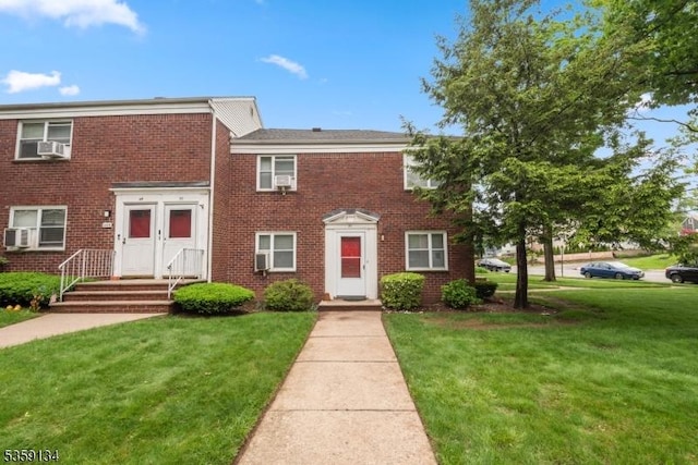 465 Maple Hill Dr Unit 51, Hackensack City, NJ 07601 - view of front of property with a front yard, brick siding, and cooling unit