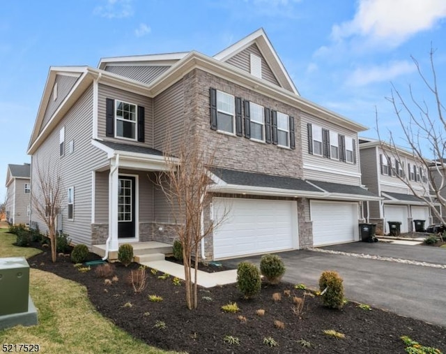 3 Eastwood Ter, East Hanover Twp, NJ 07936 - view of property with stone siding, a garage, and driveway