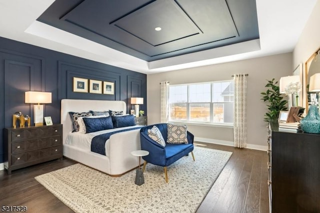 3 Eastwood Ter, East Hanover Twp, NJ 07936 - bedroom with a raised ceiling, dark wood-style floors, and baseboards