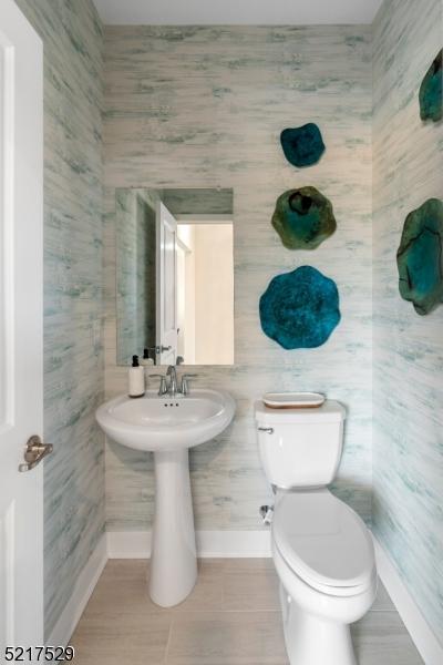 3 Eastwood Ter, East Hanover Twp, NJ 07936 - bathroom with baseboards and toilet