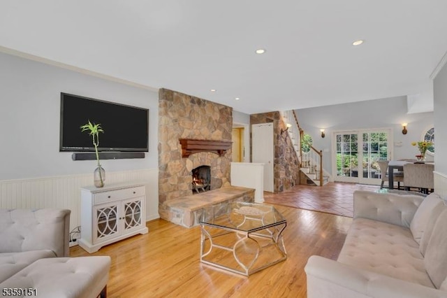 60 Dogwood Ln, Montgomery Twp, NJ 08558 - living area featuring stairs, a wainscoted wall, wood finished floors, a fireplace, and recessed lighting