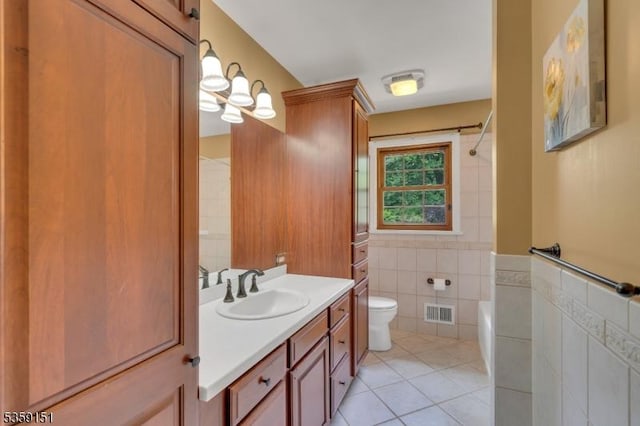 60 Dogwood Ln, Montgomery Twp, NJ 08558 - bathroom featuring tile walls, a tub, tile patterned flooring, vanity, and toilet