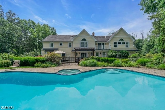 60 Dogwood Ln, Montgomery Twp, NJ 08558 - view of pool featuring a pool with connected hot tub