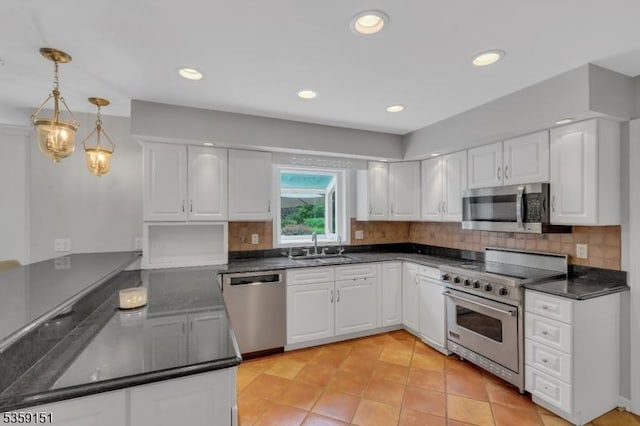 60 Dogwood Ln, Montgomery Twp, NJ 08558 - kitchen featuring stainless steel appliances, dark countertops, tasteful backsplash, white cabinetry, and recessed lighting