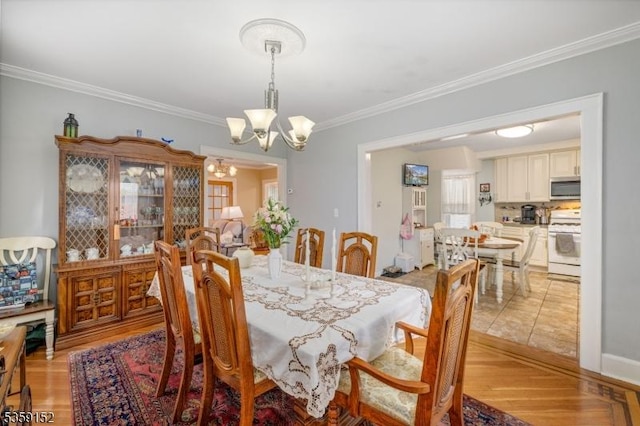 756-758 Cleveland Ave, Elizabeth City, NJ 07208 - dining space with a chandelier, ornamental molding, and light wood-type flooring