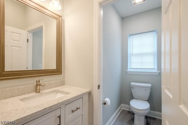 2000 Whittier St, Rahway City, NJ 07065 - bathroom featuring vanity, toilet, and baseboards