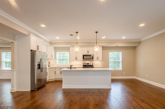 2000 Whittier St, Rahway City, NJ 07065 - kitchen with stainless steel appliances, a sink, dark wood-style flooring, white cabinetry, and ornamental molding