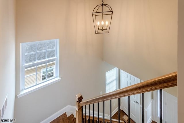2000 Whittier St, Rahway City, NJ 07065 - staircase with a chandelier and baseboards