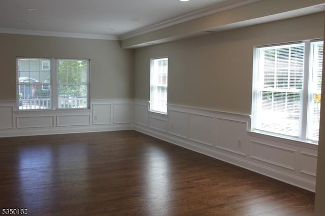 2000 Whittier St, Rahway City, NJ 07065 - unfurnished room featuring crown molding, dark wood-style floors, a wainscoted wall, and a decorative wall