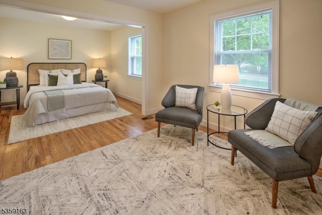 41 Lake Rd, Bernards Twp, NJ 07920 - bedroom with multiple windows, wood finished floors, and baseboards