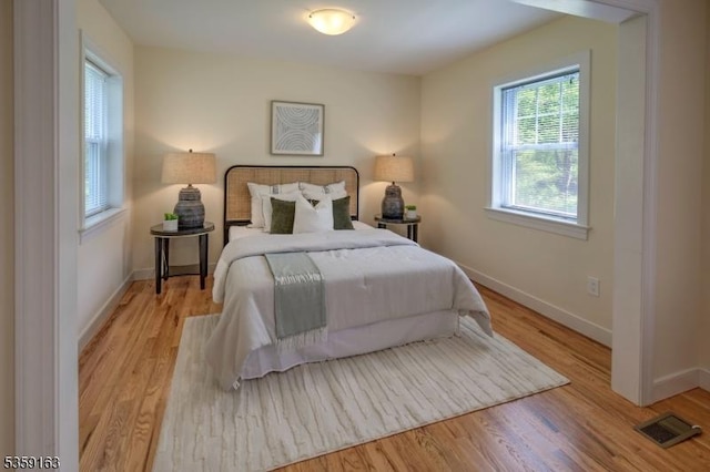 41 Lake Rd, Bernards Twp, NJ 07920 - bedroom with baseboards and wood finished floors