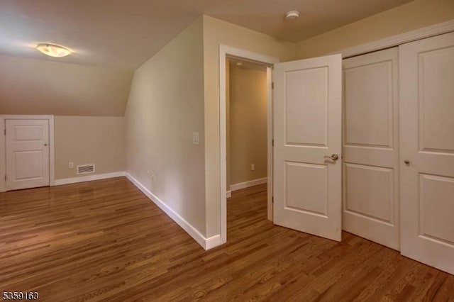 41 Lake Rd, Bernards Twp, NJ 07920 - additional living space with wood finished floors, baseboards, and lofted ceiling