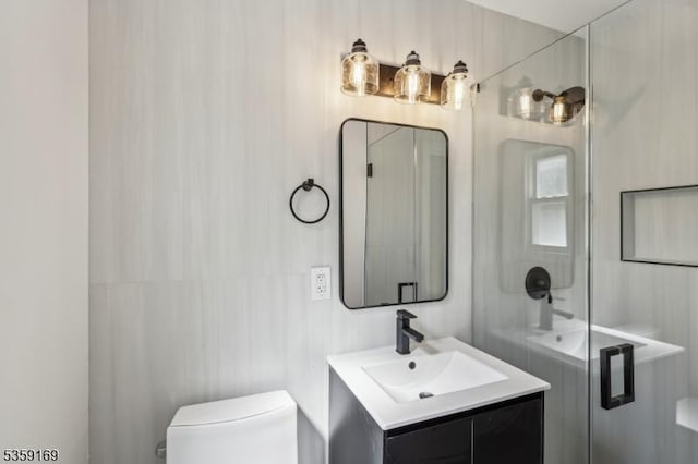 158 Old Indian Rd, West Orange Twp, NJ 07052 - bathroom featuring toilet, vanity, and an enclosed shower