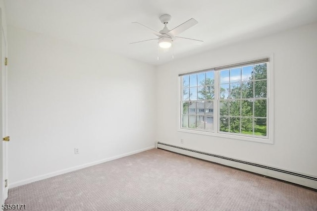9 Baker Rd, Livingston Twp, NJ 07039 - unfurnished room with baseboard heating, ceiling fan, baseboards, and carpet