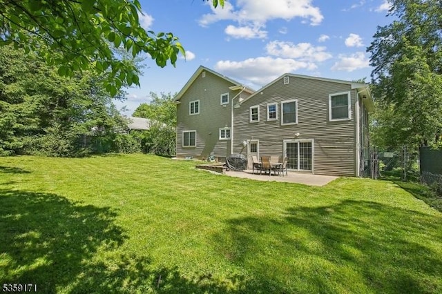 9 Baker Rd, Livingston Twp, NJ 07039 - back of property with a patio