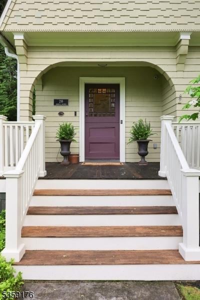 216 Kimball Ave, Westfield Town, NJ 07090 - entrance to property with covered porch and roof with shingles