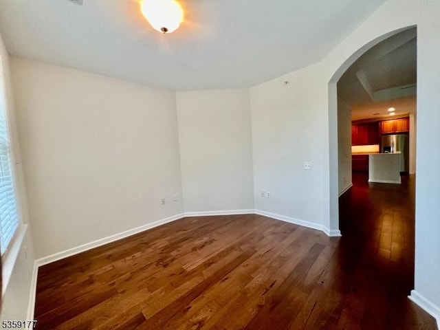 24 Ridgeview Ln Unit 24, Mount Arlington Boro, NJ 07856 - spare room with dark wood finished floors, arched walkways, and baseboards