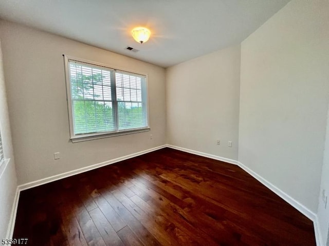24 Ridgeview Ln Unit 24, Mount Arlington Boro, NJ 07856 - empty room with dark wood-style flooring and baseboards